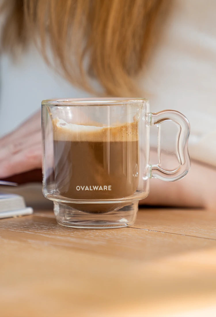 Double wall espresso mug on a wooden table